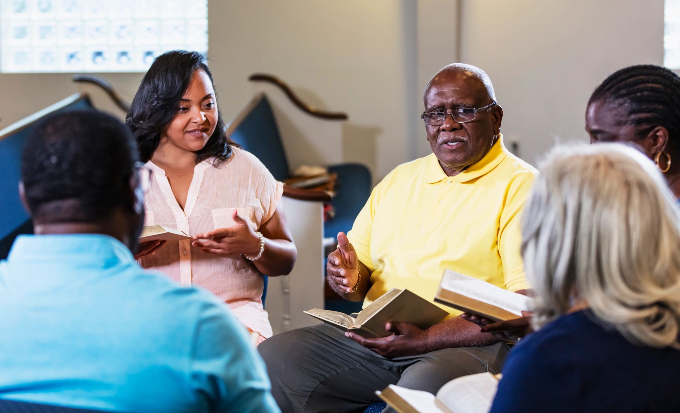 Small group Bible study discussion in a church setting